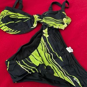 Women’s size large black bikini with stripes and hints of floral